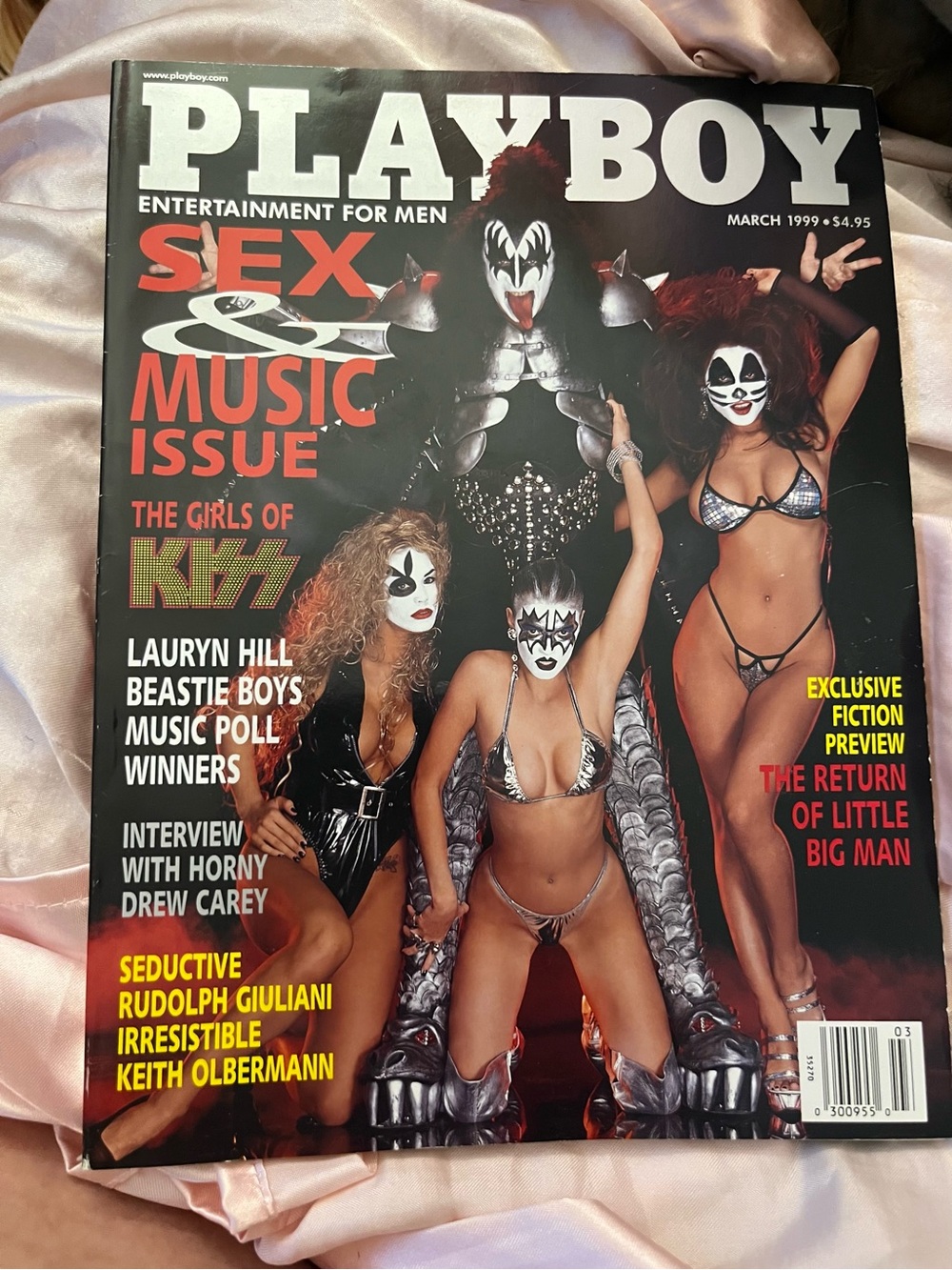 Playboy magazine cover from March 1999 featuring the rock band KISS.